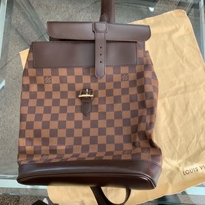 Louis Vuitton Backpack includes Wallet